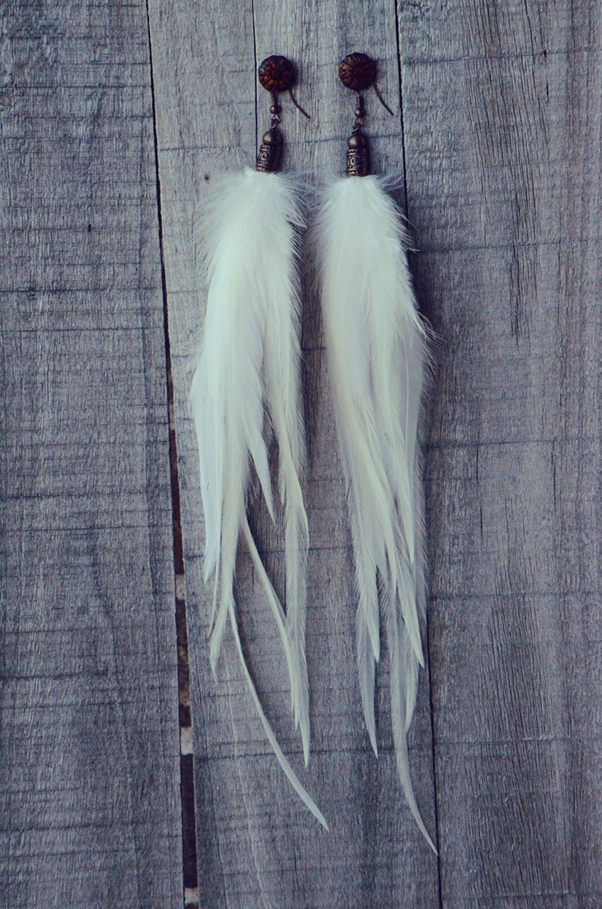white feather earrings