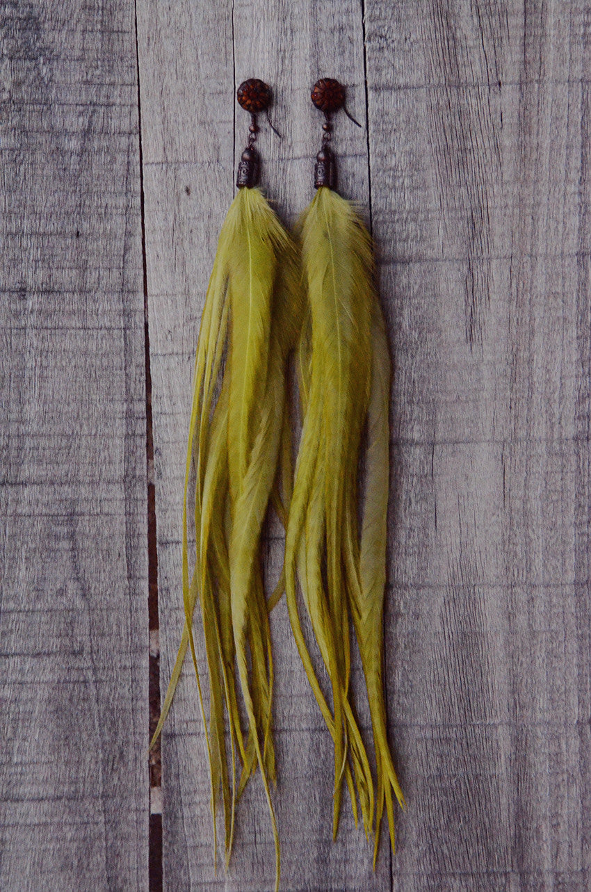 green feather earrings