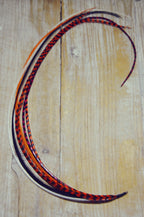 long hair feathers orange